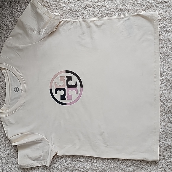 Tory Burch Tops - TORI BURCH **T Shirt, Size XL. Ivory background w pink/plum emblem.